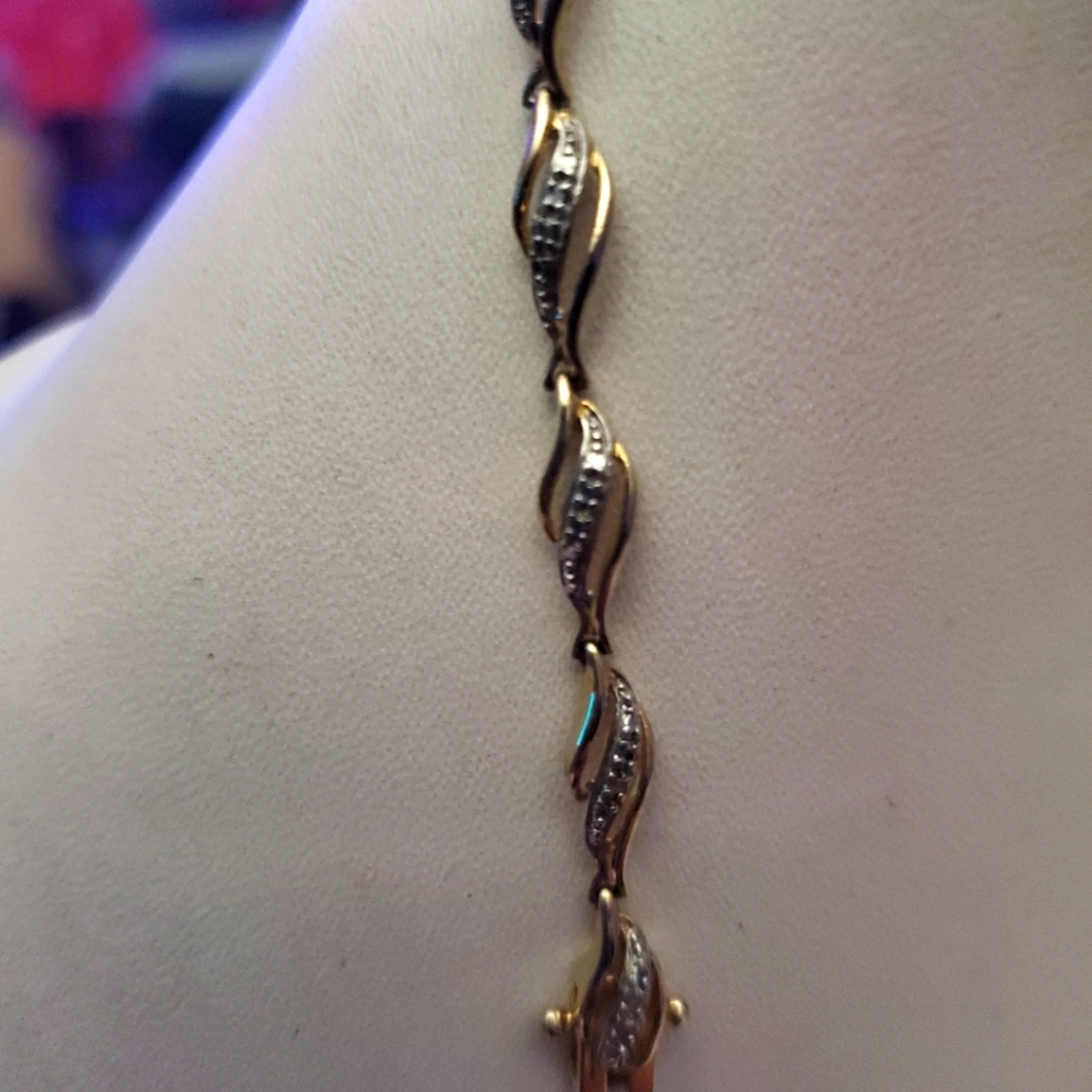 Women's 1/2 ctw tennis bracelet yellow gold.